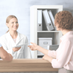 Medical practice front desk using athenaOne software | Virtual OfficeWare