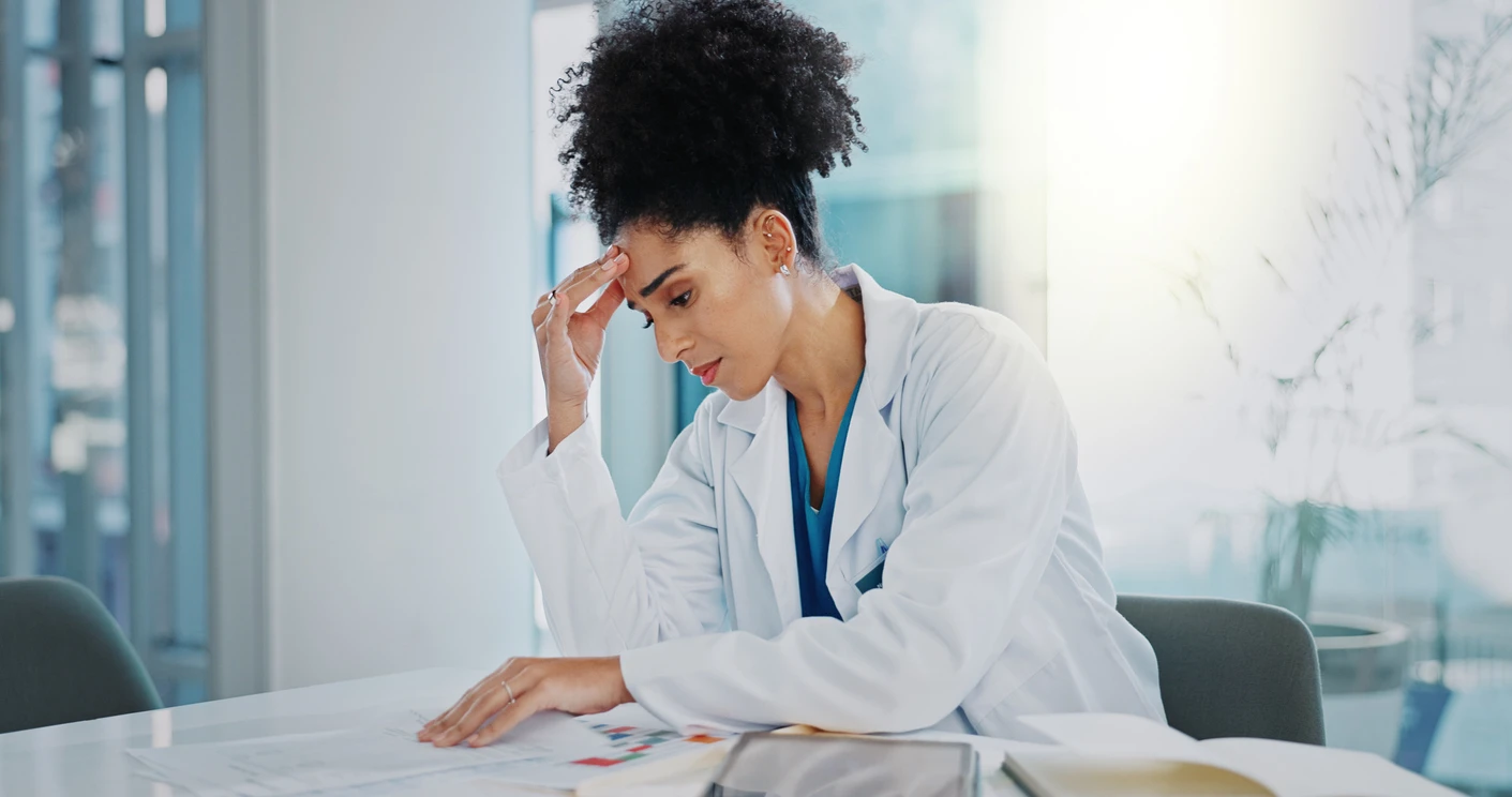 Doctor analyzing fragmented healthcare data with unclear quality metrics.