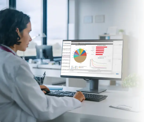 Physician reviewing predictive analytics for proactive care