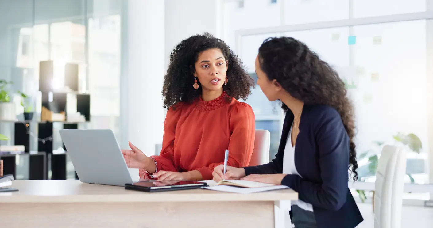 Healthcare IT consultant helping a physician evaluate EHR and practice management software