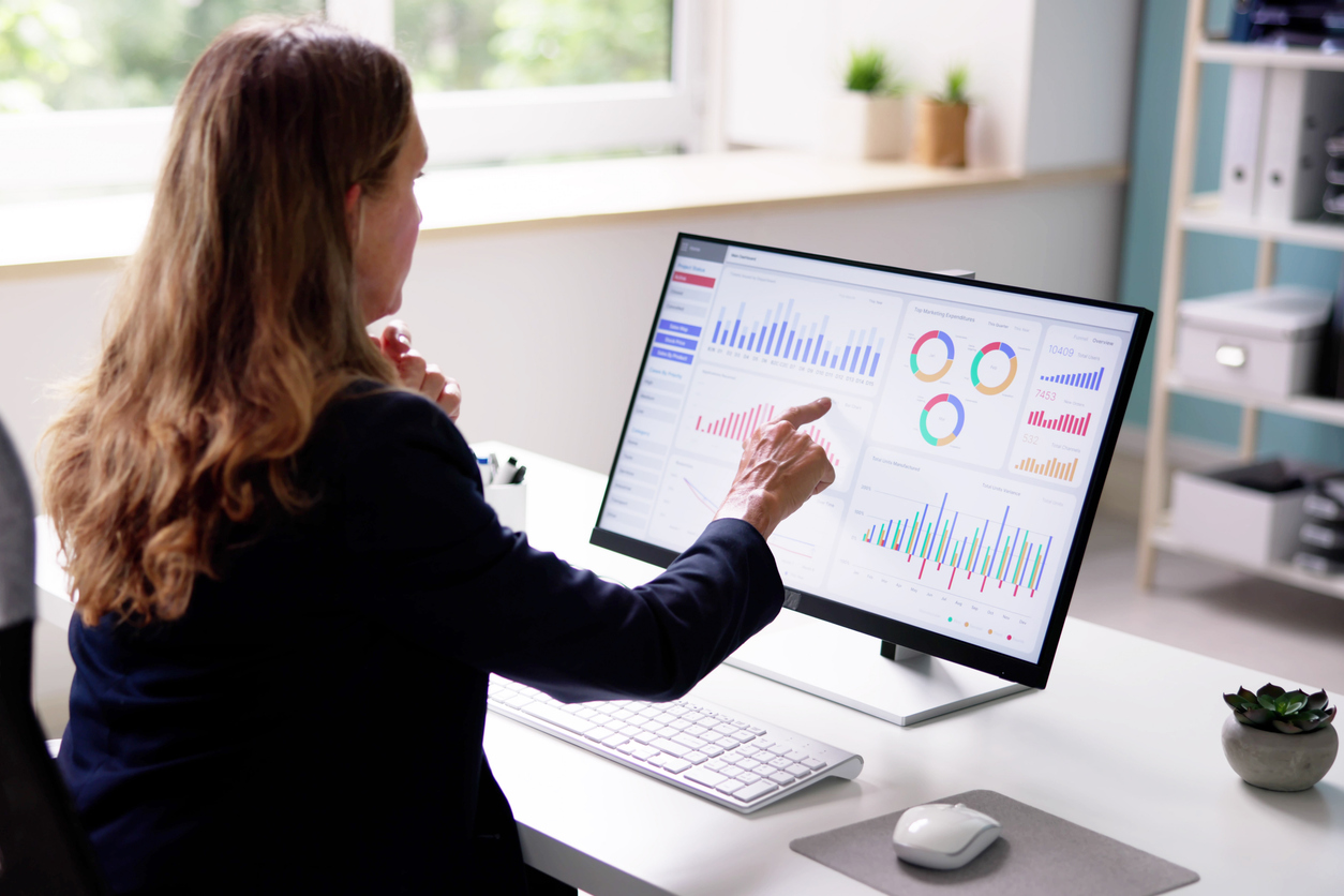 Healthcare administrator reviewing billing and practice management information for a mental health practice.