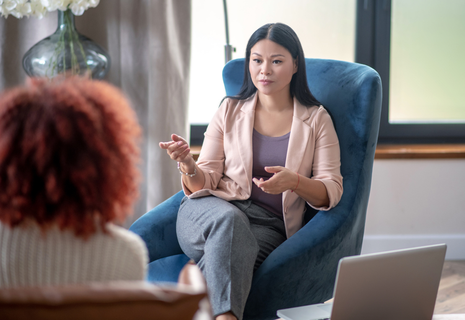 Mental health clinician with client using AdvancedMD EHR supported by Virtual OfficeWare