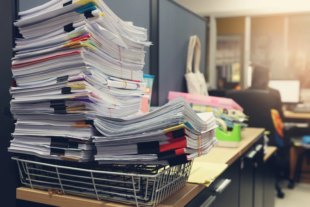 Manual prior authorization workflow with paperwork and fragmented systems causing delays and claim denials