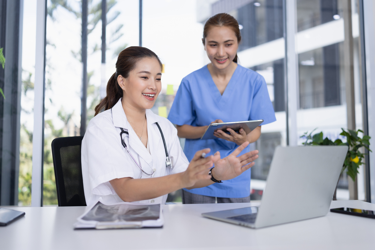 Healthcare team using streamlined digital workflow and software to improve efficiency and reduce admin burden