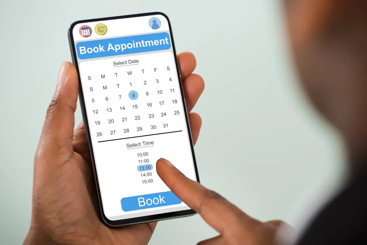 Patient scheduling a healthcare appointment online through a digital self-scheduling platform