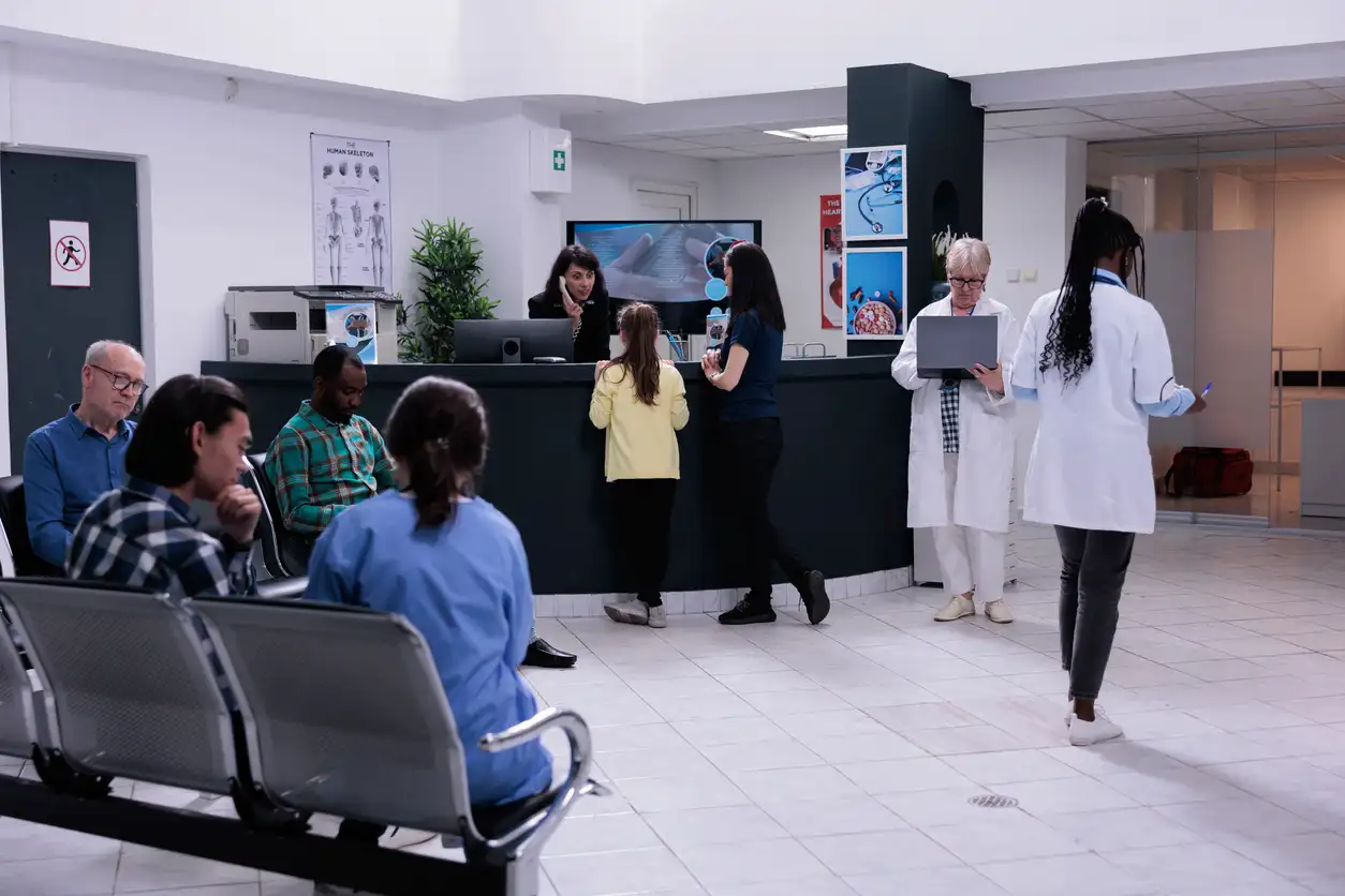 Front desk staff in a medical practice managing high call volume and patient intake simultaneously