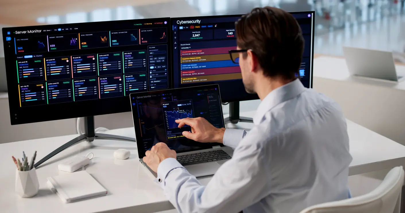 Male IT professional using AI-powered healthcare threat detection monitoring system