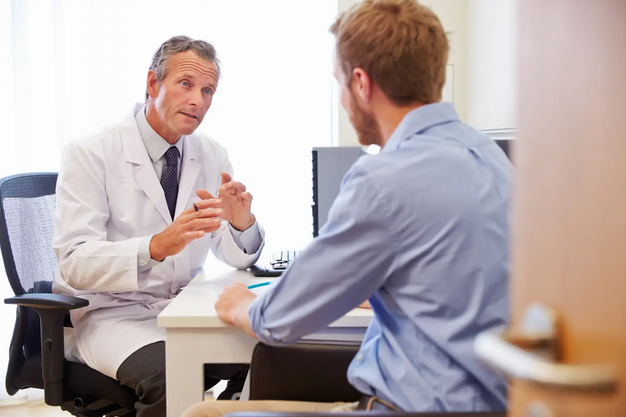 Healthcare provider discussing care and follow-up with an ambulatory patient