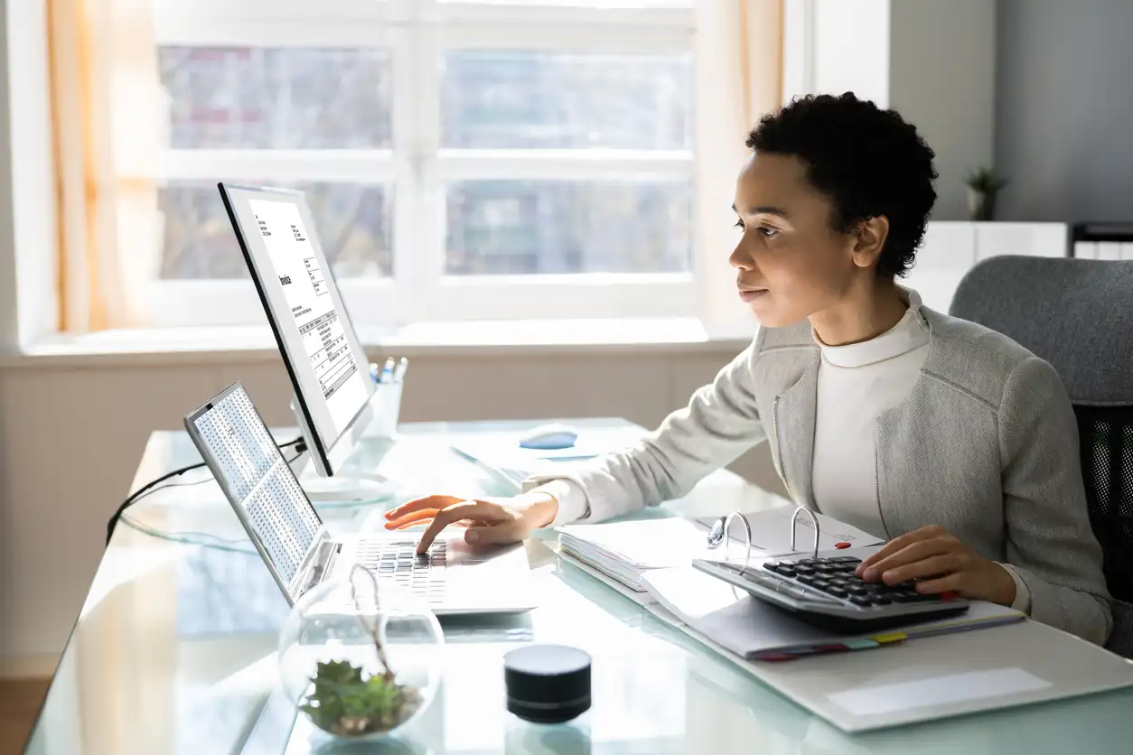 Medical biller reviewing revenue cycle workflows